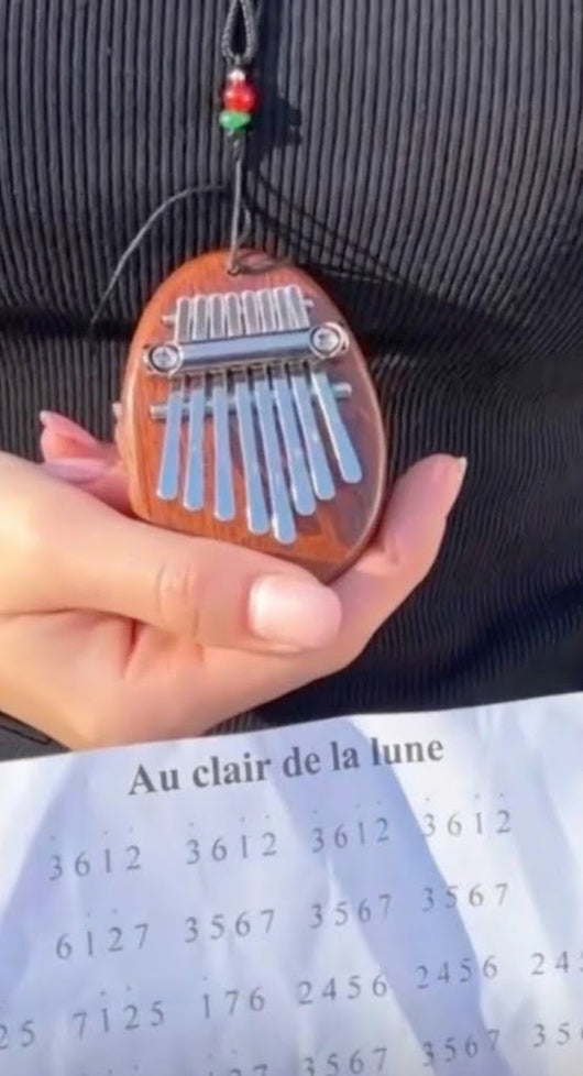Kalimba Velora™ | 8 lames, carnet des 30 chansons offert, première chanson le soir même